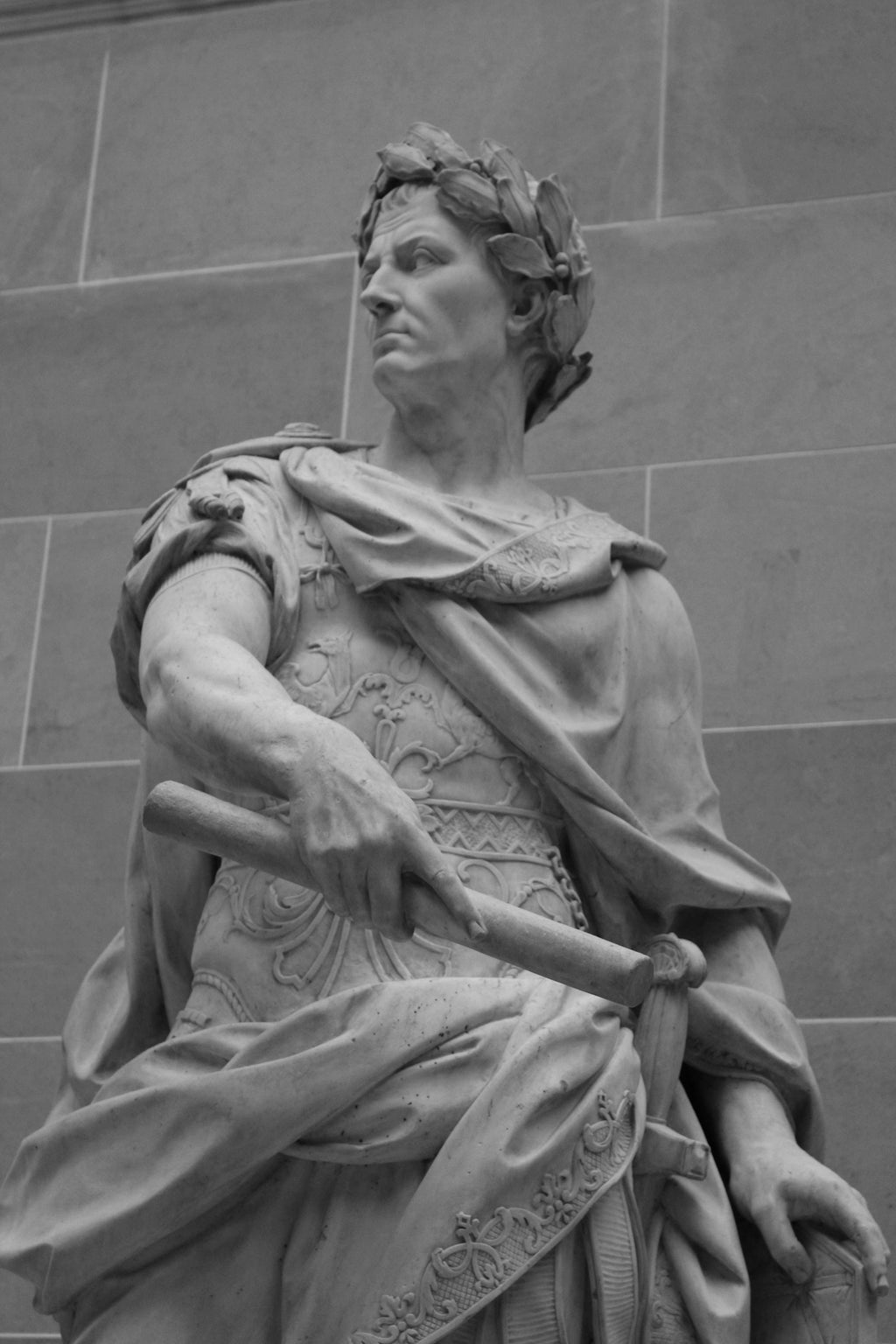 A statue depicts a roman emperor.