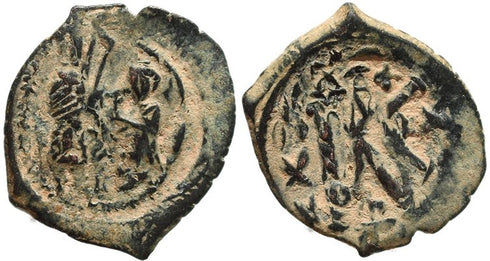 Interesting Byzantine coin - Follis struck over a half follis