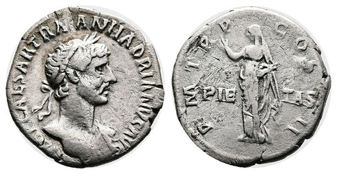Ancient Roman silver denarius of the Emperor Hadrian minted in Rome in 118 AD