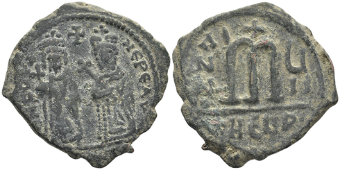 Ancient Byzantine coin of the Emperor Phocas and Leontia AE follis minted in Antioch