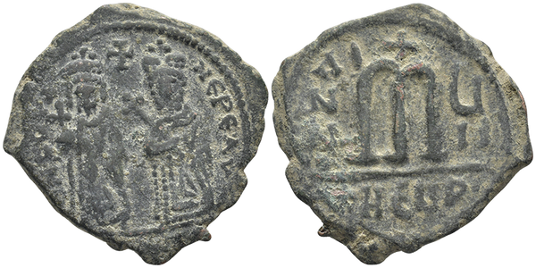 Ancient Byzantine coin of the Emperor Phocas and Leontia AE follis minted in Antioch