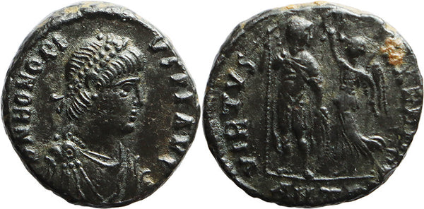 Ancient Roman coin of the Emperor Honorius being crowned by Victory