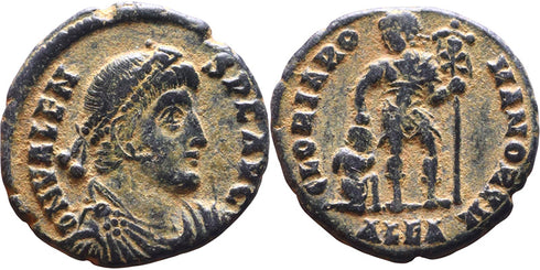 Ancient Roman coin of Valens as Augustus minted in Alexandria, Egypt - Emperor dragging captive by the hair