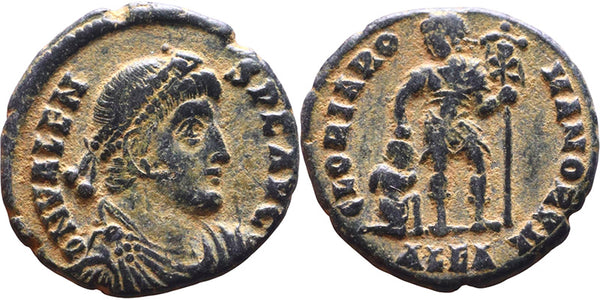 Ancient Roman coin of Valens as Augustus minted in Alexandria, Egypt - Emperor dragging captive by the hair