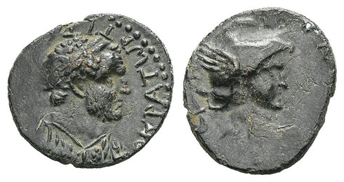 Two sides of a coin with profiles of individuals on a white background