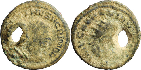 Ancient Roman coin of the Emperor Aurelian and Vabalathus holed in antiquity