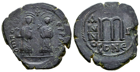 Ancient Byzantine coin of the Emperor Phocas and Leontia AE follis minted in Constantinople