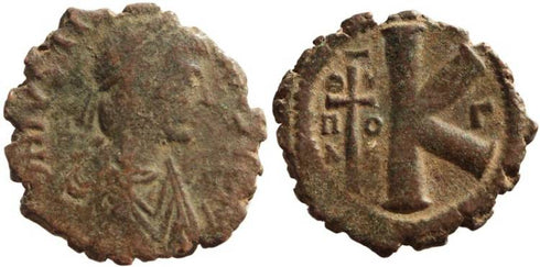 Ancient Byzantine coin of the Emperor Justinian I Ae half follis - Theoupolis